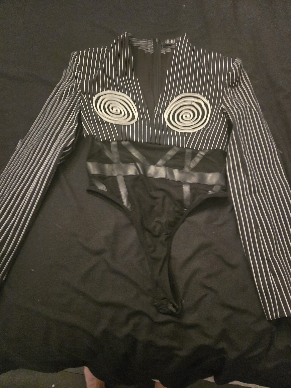 AKIRA Black Pinstripe Long Sleeve Bodysuit with White Spiral Appliqué